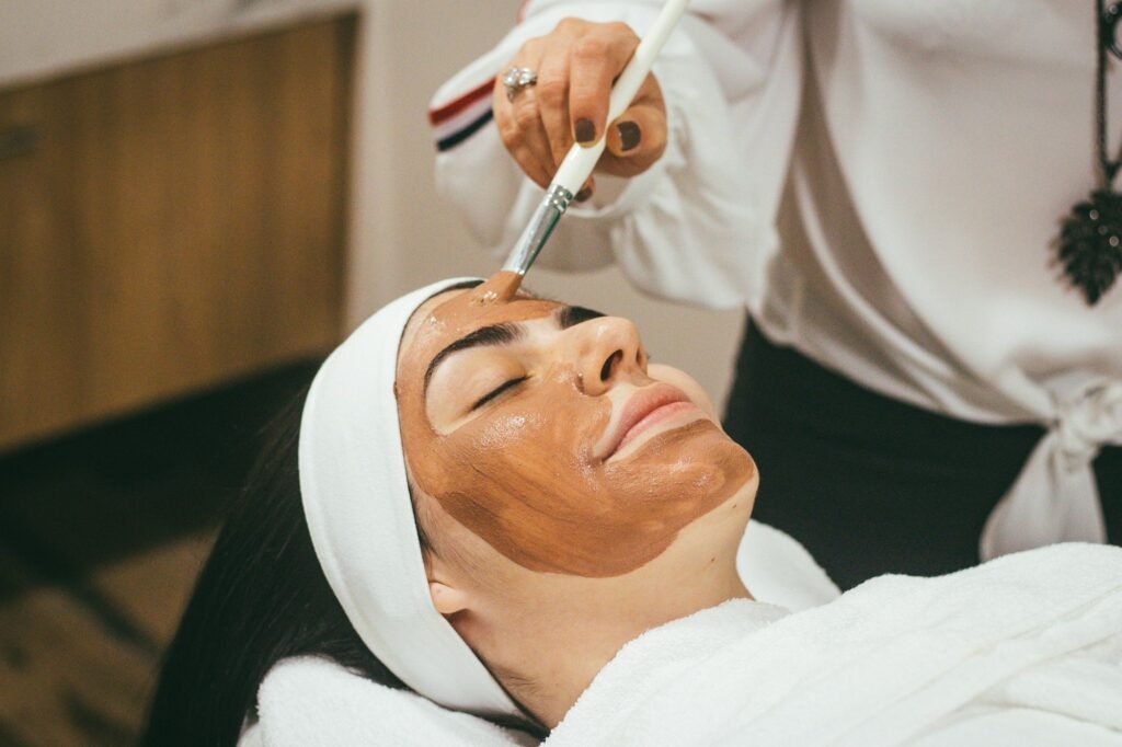 Guest receiving a facial mask treatment